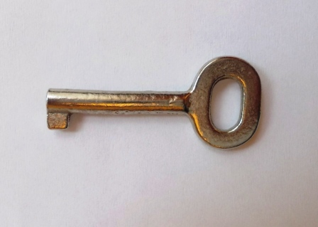 Schlüssel für Druckknopfmelder